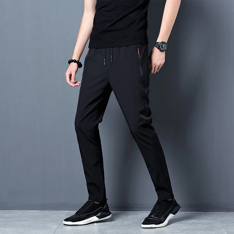 Summer new men's casual pants slim Korean ice silk pants Jin round thin sports pants straight tube quick drying pants